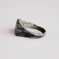 Opposite side view of medieval silver ring Radomir showing continuous hoop taper