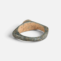Roman bronze ring 'Aquilarius' shows the back of its round bezel and the inside of the hoop.