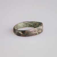 Profile of medieval bronze ring Radenko revealing D-section hoop and cupric corrosion.