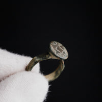 Profile silhouette of medieval bronze ring 'Aldric' showing bezel elevation and hoop taper