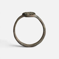 Byzantine bronze ring 'Kassia' shows its complete hoop and the oval bezel edge in profile.