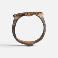 Medieval bronze ring 'Rhombulus' shows its complete hoop and the thin navette bezel edge in profile.