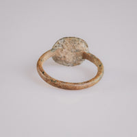 Rear view of Byzantine bronze ring Theodora with intact round-section hoop and patina