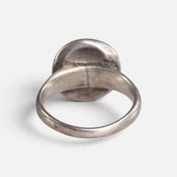 Byzantine silver ring 'Chrysanthos' shows the back of its circular bezel and the inside of its hoop.