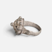 Byzantine silver ring 'Thalios' shows its domed bezel edge and broad hoop from the opposite side.