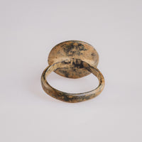 Rear view of medieval bronze ring Aldric showing concave bezel underside and olive-green patina