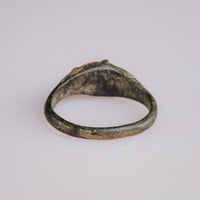 Rear view of medieval bronze ring Vukmir showing D-section hoop and worn patina
