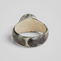 Rear view of medieval bronze ring 'Wistan' showing the back of the bezel and hoop