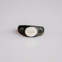 Roman bronze intaglio ring Velthur, top view of white chalcedony bezel engraved with Mercury figure
