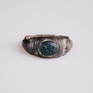 Roman bronze intaglio ring Volusenus with blue-green glass paste bezel, front view