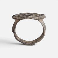 Roman bronze ring 'Cassia' shows its full hoop and the pointed oval bezel edge in profile.