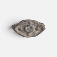 Roman bronze ring 'Cassia' shows a central ring and smaller round marks on its pointed oval bezel.
