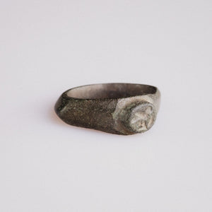 Roman bronze ring Corvellus side profile showing triangular shoulders and green patina