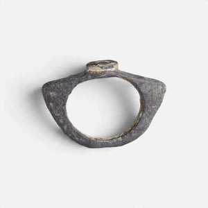 Roman bronze ring 'Equidus' shows its angular hoop and the small raised bezel edge in profile.