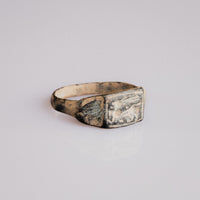 Roman bronze ring Grypho showing incised shoulders and engraved winged quadruped