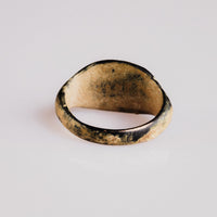 Roman bronze ring Leonis interior view with exposed golden-bronze metal