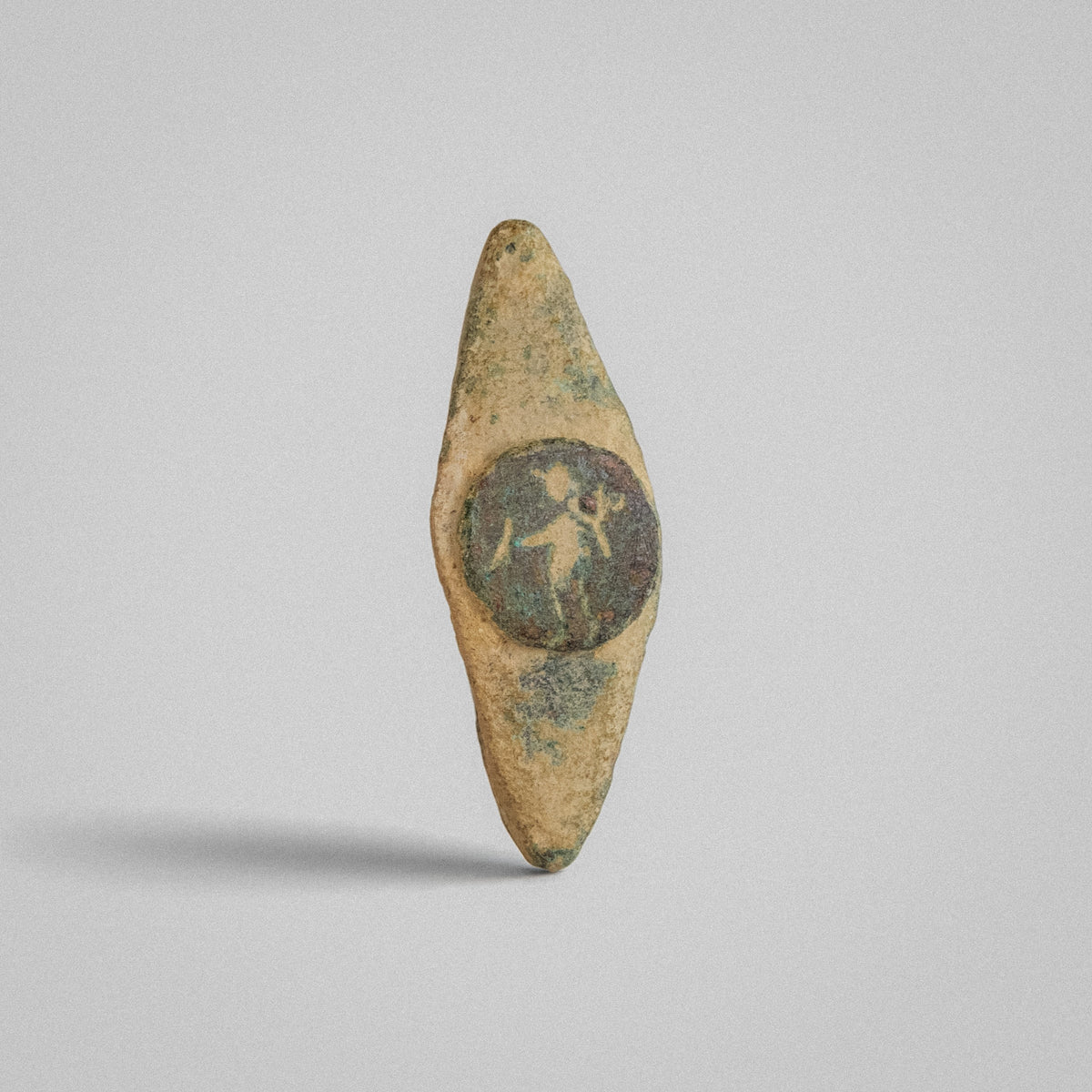 Roman bronze ring Verecundus, upright front view of navette-shaped plan and figure intaglio