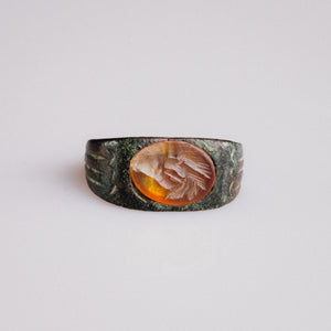 Roman bronze ring Palmata with carnelian intaglio palm frond, top view