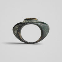 Roman bronze ring Vultinus, front view of hoop and stepped bezel platform