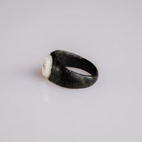 Roman bronze ring Velthur, opposite three-quarter angle showing bezel setting and stone edge