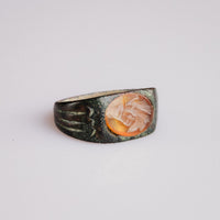 Roman bronze signet Palmata showing fluted shoulder grooves and carnelian bezel