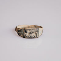 Roman bronze signet ring Grypho with rectangular griffin bezel, front view