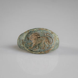 Roman bronze signet ring Leonis with engraved striding lion motif on oval bezel