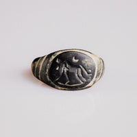 Roman bronze signet ring Leonis with lion and crescent intaglio bezel