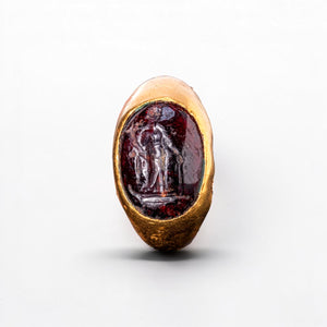Garnet intaglio of Fortuna with cornucopia and rudder, top view