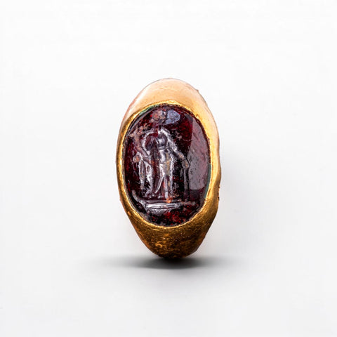 Garnet intaglio of Fortuna with cornucopia and rudder, top view