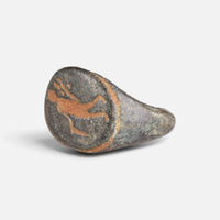Roman bronze ring 'Mercurialis' shows its figural bezel engraving from the opposite front angle.