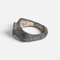 Roman bronze ring 'Equidus' shows its bezel edge and broad shoulder from the opposite side.