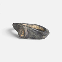 Roman bronze ring 'Equidus' shows its circular bezel and pointed shoulder from the opposite angle.