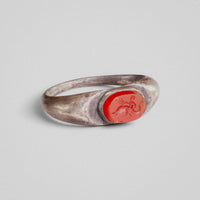Roman silver ring Marinus, close view of intaglio figure with trident on carnelian