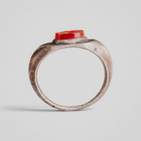 Roman silver ring Marinus, profile view showing raised oval collet and carnelian stone