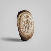 Roman silver ring Tychion, close view of the oval bezel with standing deity holding a patera.