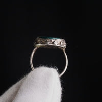 Sasanian silver ring Bahram elevation view highlighting collet granulation and hoop