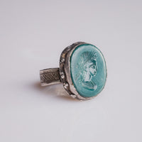 Sasanian silver ring Bahram showing cross-hatched band and granulated collet, angled view