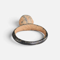 Byzantine bronze ring 'Peristerios' shows the back of its circular bezel and the inside of the hoop.