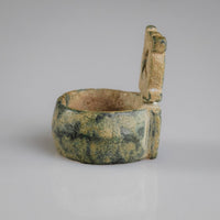 Side profile of Byzantine bronze ring Stavros showing bezel axle and D-section hoop