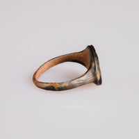 Side profile of Byzantine bronze ring Theodoros with ribbed shoulders and D-section hoop