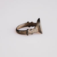 Side profile of Byzantine bronze ring Theodulos with castellated notched shoulders