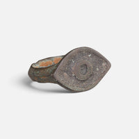 Roman bronze ring 'Catulla' shows its pointed oval bezel decoration and broad shoulder at an angle.