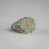 Side profile of Roman bronze ring Leonis showing D-section hoop and lion bezel