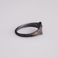 Side profile of Roman bronze signet ring Formica revealing thin D-section hoop