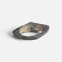 Roman bronze ring 'Equidus' shows its plain inner bezel and the broad hoop from behind.