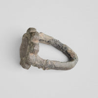 Side view of medieval bronze ring Rosalind with beaded shoulder collar