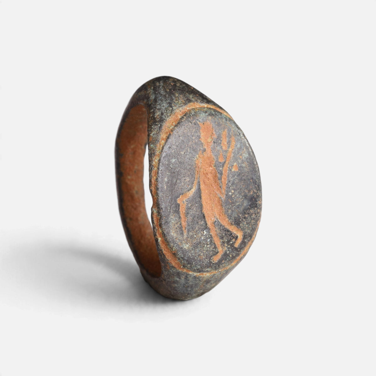 Roman bronze ring 'Mercurialis' shows its oval figural engraving and complete hoop from another angle.