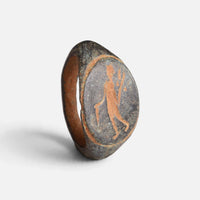 Roman bronze ring 'Mercurialis' shows its oval figural engraving and complete hoop from another angle.