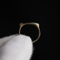 Silhouette profile of Roman bronze ring Numerius highlighting integral cast bezel